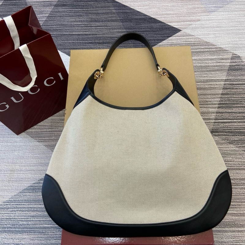 G*u*i top handle bags